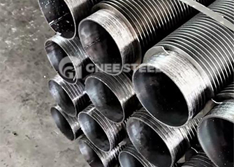 What is the purpose of the finned tube?